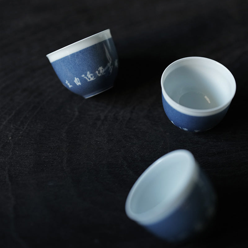 Jingdezhen Powder Blue Script Teacups (Set of 3) 景德镇洒蓝诗文品茗杯（三枚入）