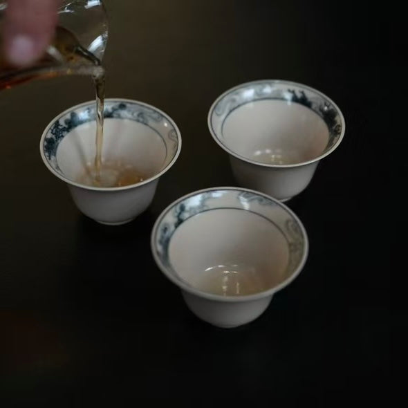 Blue and White "Ancient Pine" Horseshoe Tea Cup