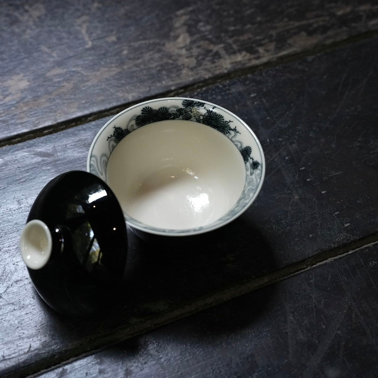 Blue and White "Ancient Pine" Horseshoe Tea Cup