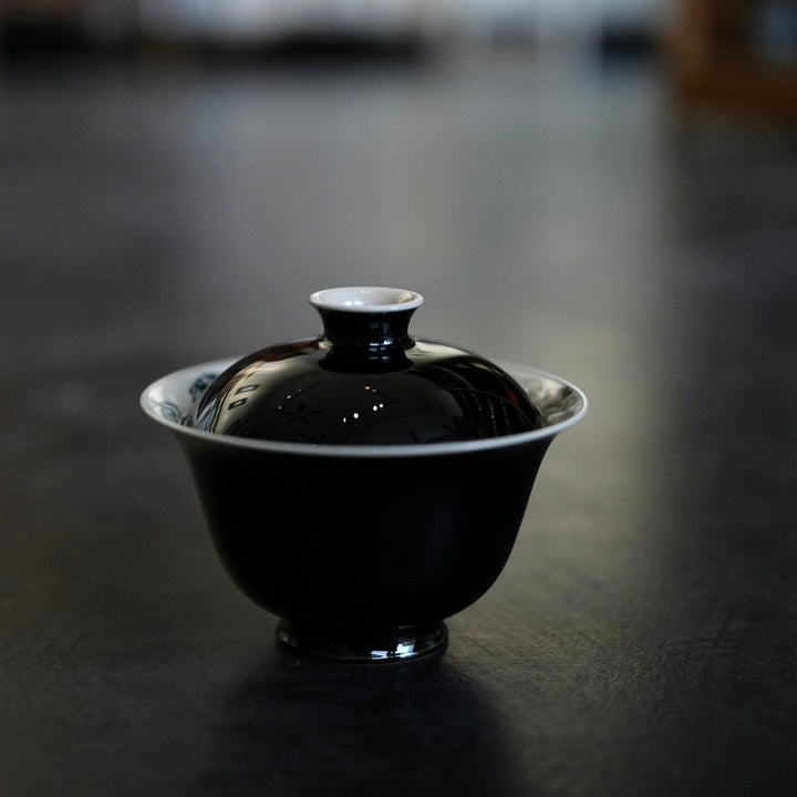 Blue and White "Ancient Pine" Horseshoe Tea Cup