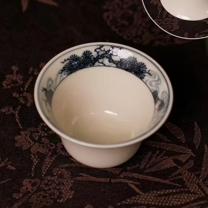 Blue and White "Ancient Pine" Horseshoe Tea Cup